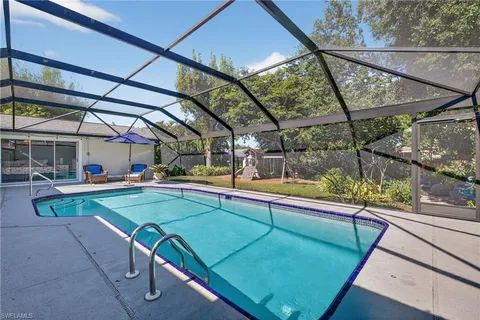 a view of a backyard with a patio