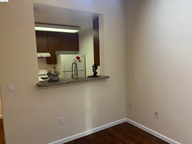 a room with a mirror and gym equipment