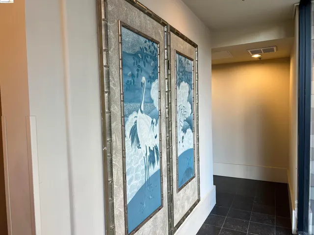 a view of a bathroom from a hallway