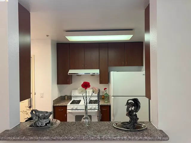 a room with a stove and a window