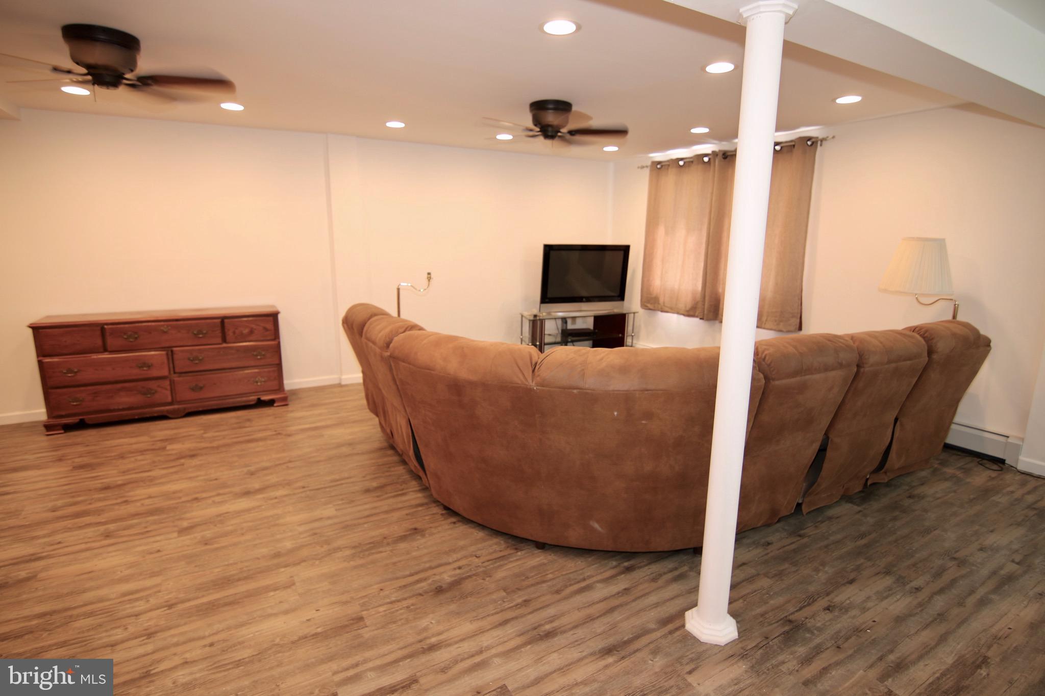 7820 Poplar Grove Road Severn, MD 21144 - Photo 22 of 34 Finished Basement with 17'X24' Family Room