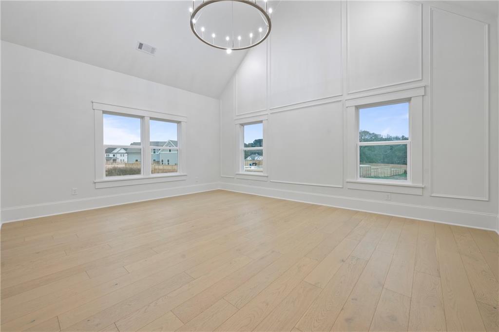 3287 Hall Road Dacula, GA 30019 - Photo 39 of 74 an empty room with windows and closet