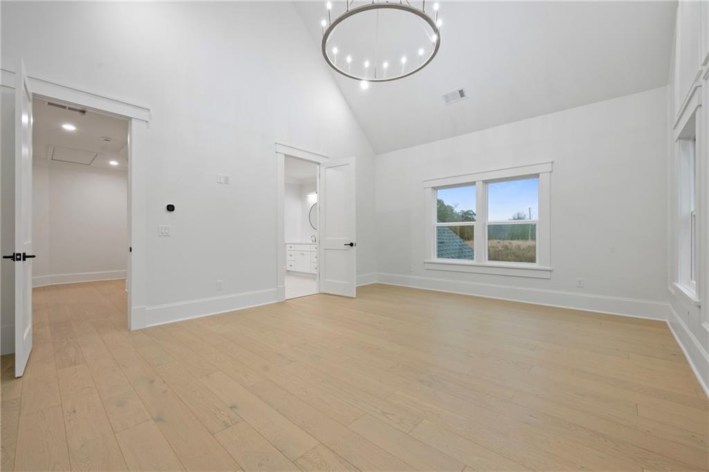3287 Hall Road Dacula, GA 30019 - Photo 40 of 74 an empty room with windows and closet