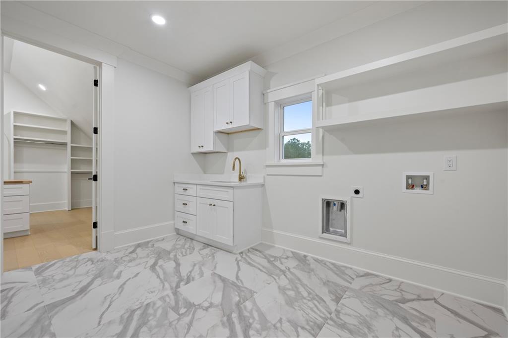 3287 Hall Road Dacula, GA 30019 - Photo 49 of 74 a room with a dresser and a window