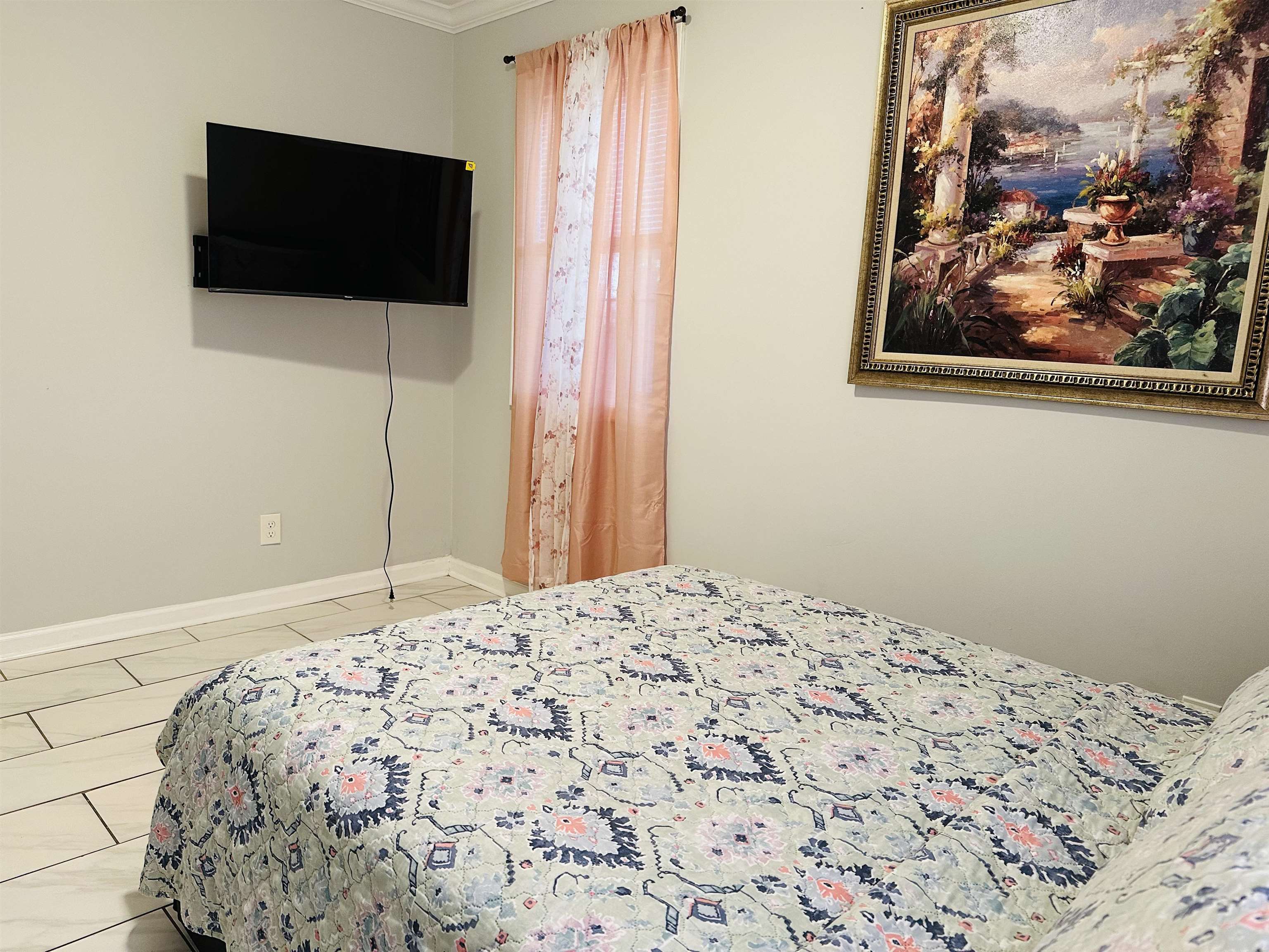 710 Vaughn Road Memphis, TN 38122 - Photo 17 of 18 Bedroom with baseboards and ornamental molding