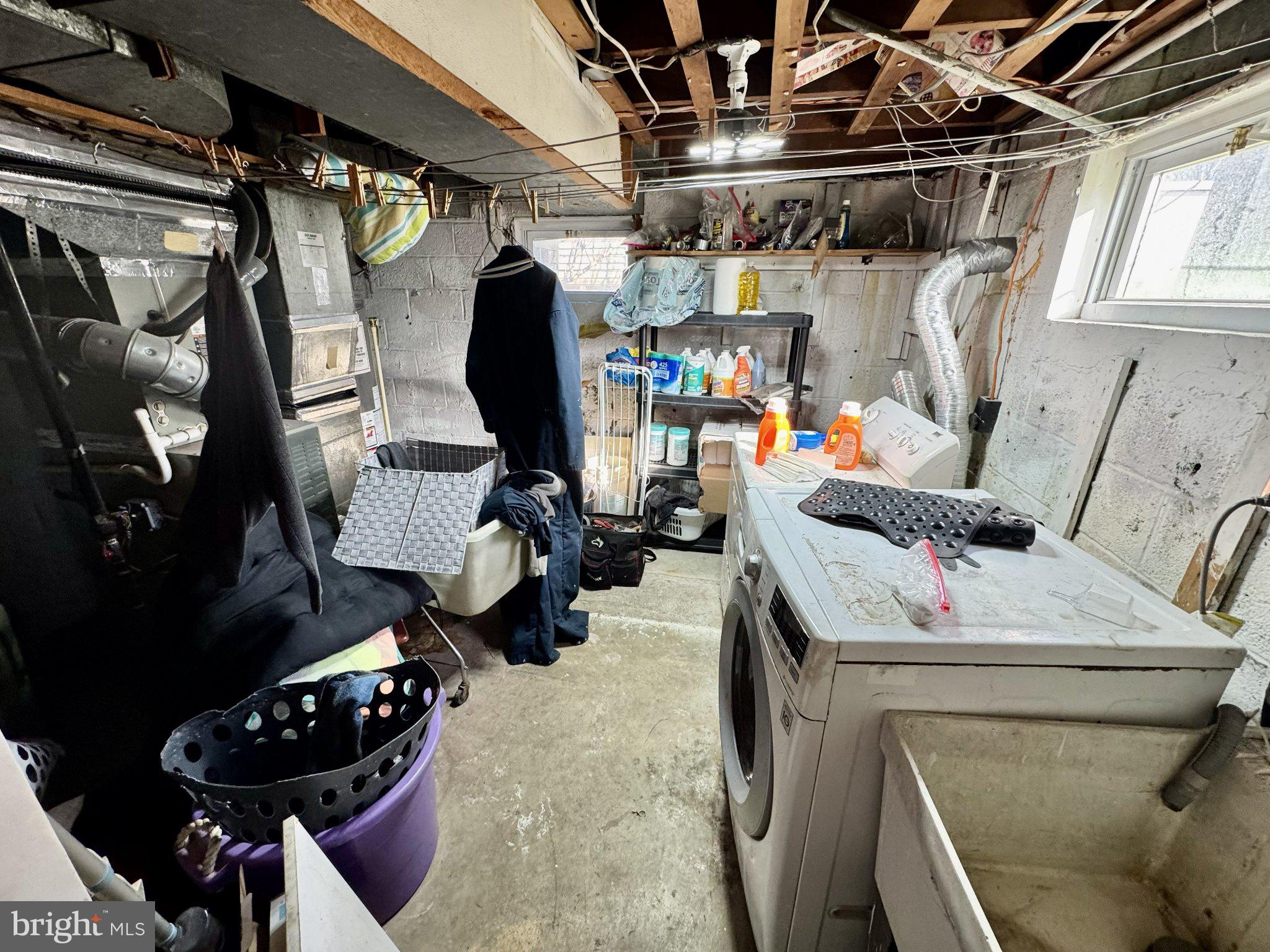 2725 North Point Road Dundalk, MD 21222 - Photo 30 of 34 Functional basement laundry space.