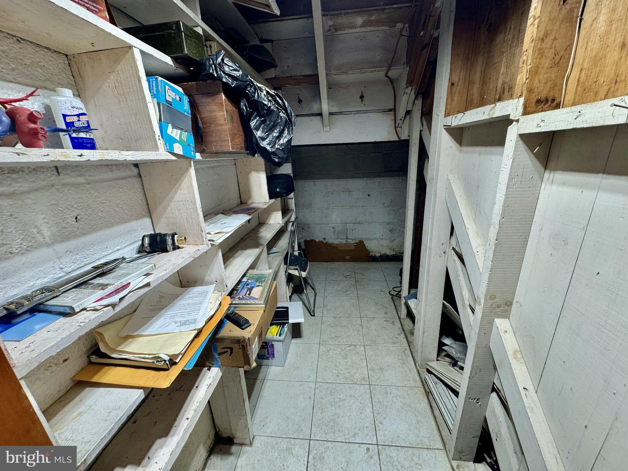 2725 North Point Road Dundalk, MD 21222 - Photo 31 of 34 Spacious storage area with shelves.