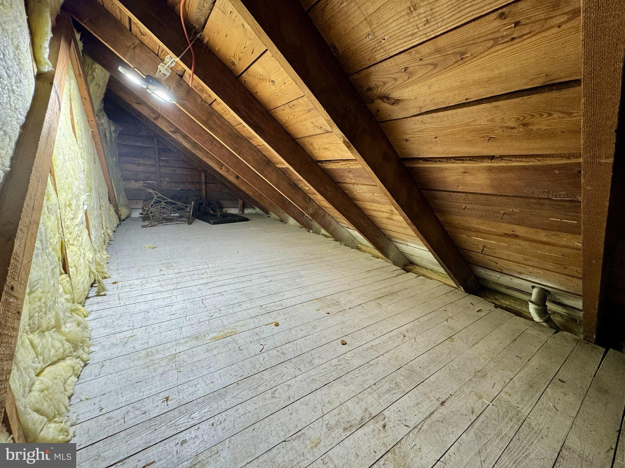 2725 North Point Road Dundalk, MD 21222 - Photo 33 of 34 Spacious attic with rustic charm.