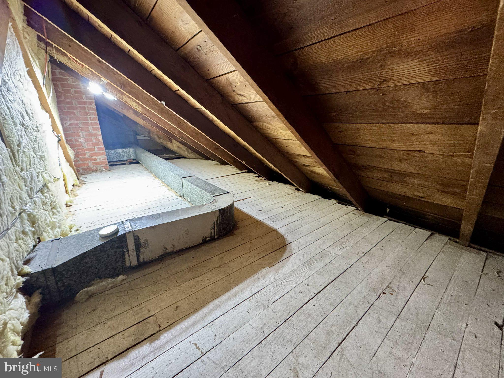 2725 North Point Road Dundalk, MD 21222 - Photo 34 of 34 Spacious attic with rustic charm.