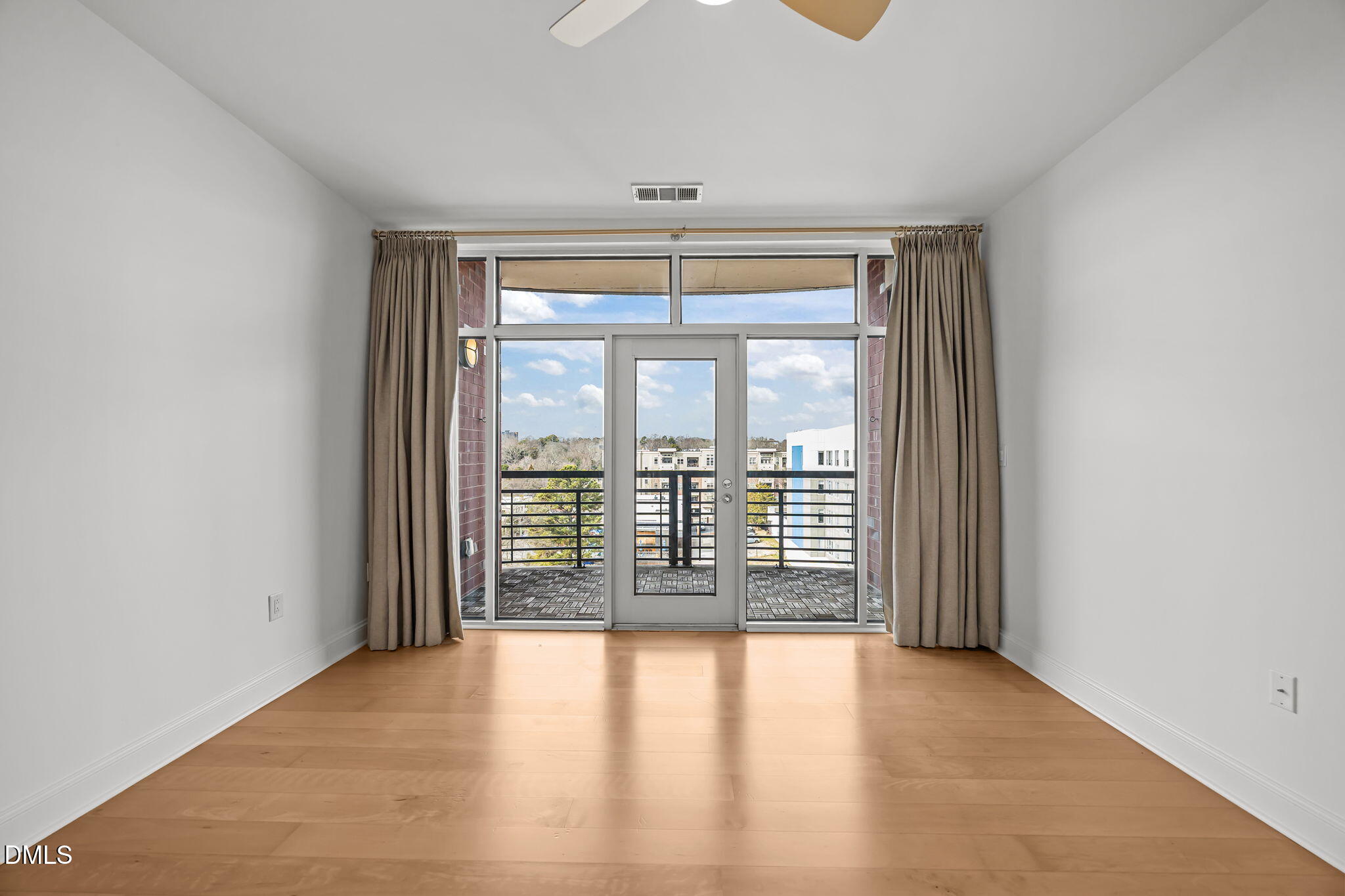 618 North Boylan Avenue, Unit 702 Raleigh, NC 27603 - Photo 15 of 42 a view of an empty room with a window