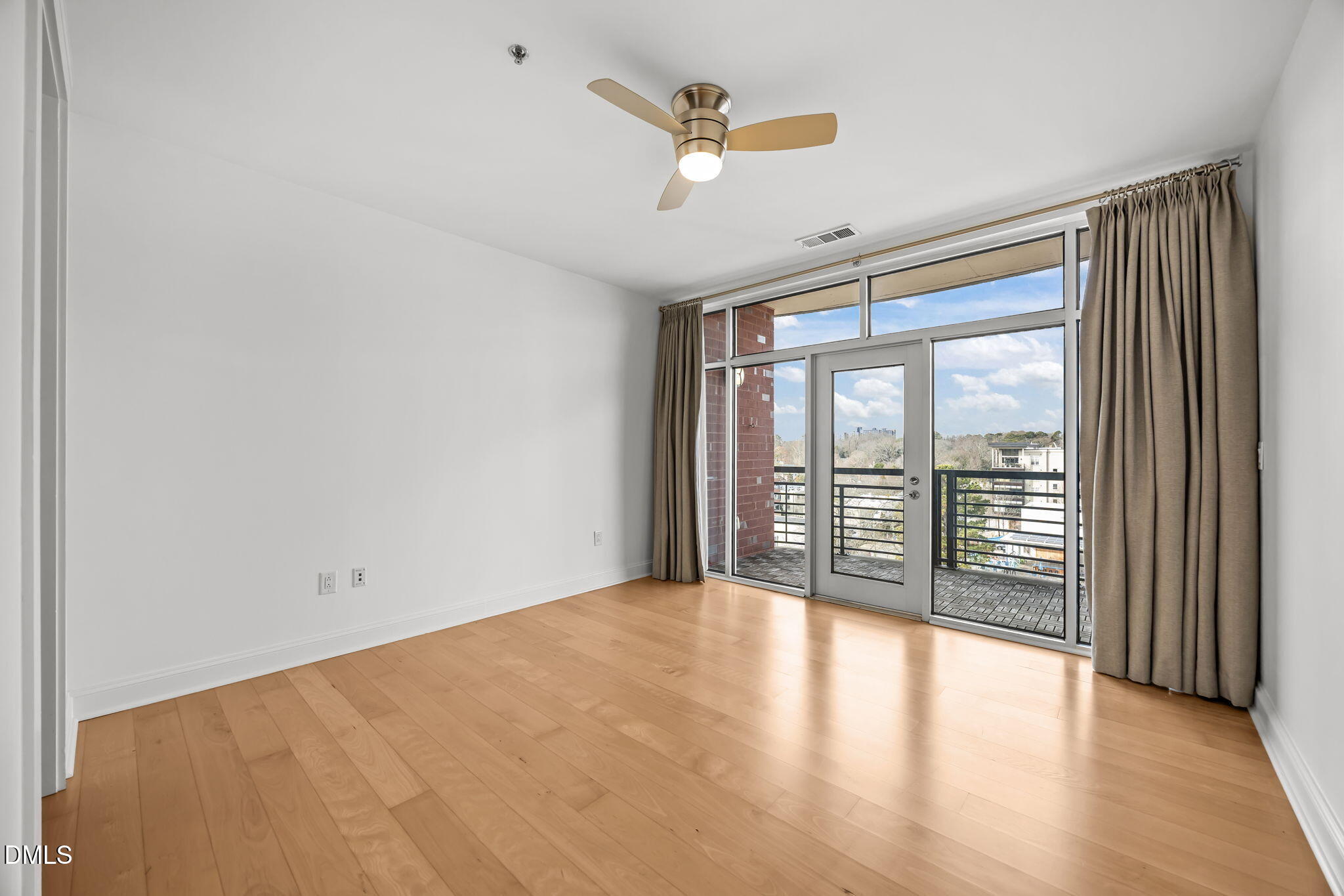 618 North Boylan Avenue, Unit 702 Raleigh, NC 27603 - Photo 16 of 42 a view of an empty room with a window