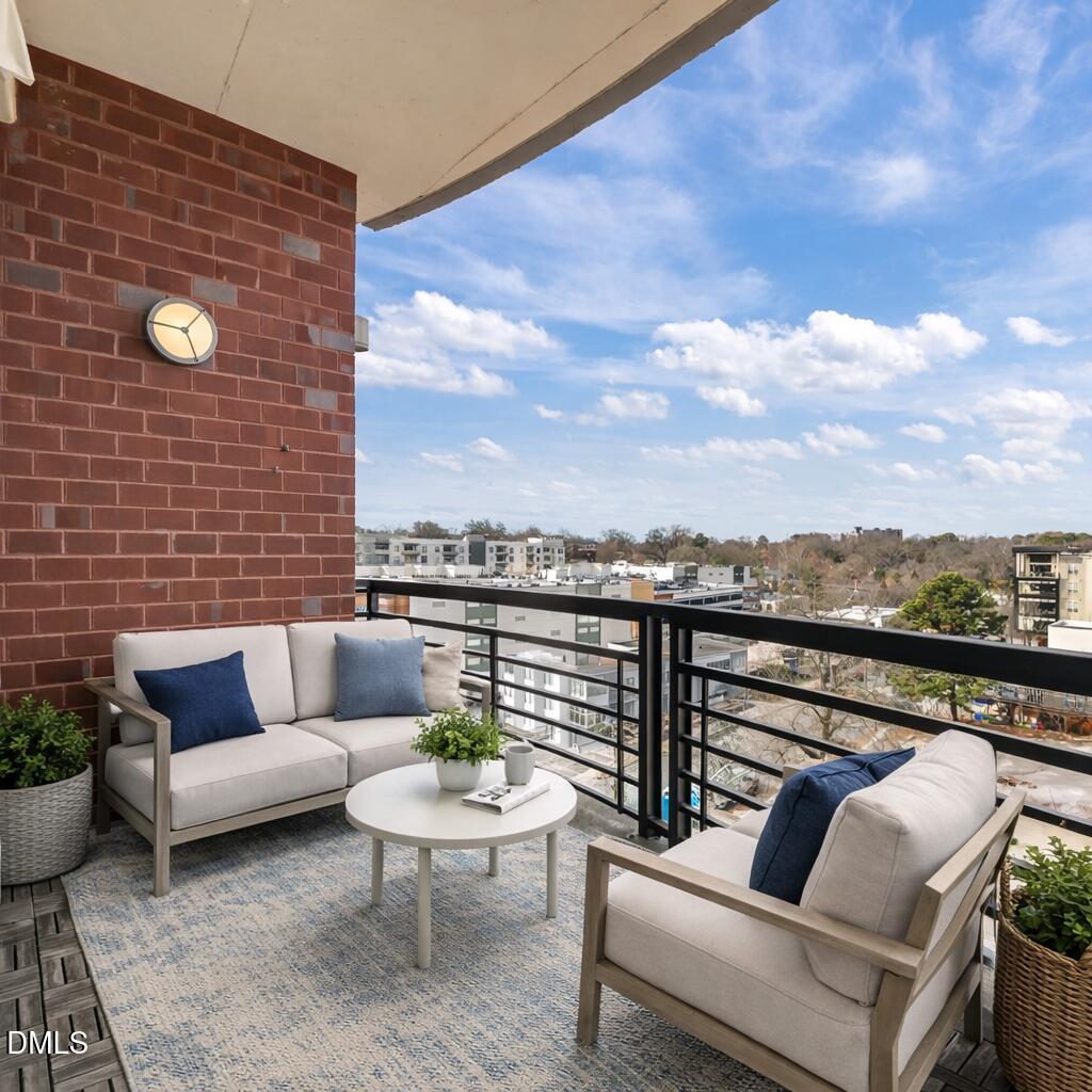 618 North Boylan Avenue, Unit 702 Raleigh, NC 27603 - Photo 18 of 42 a view of roof deck with couches and potted plants