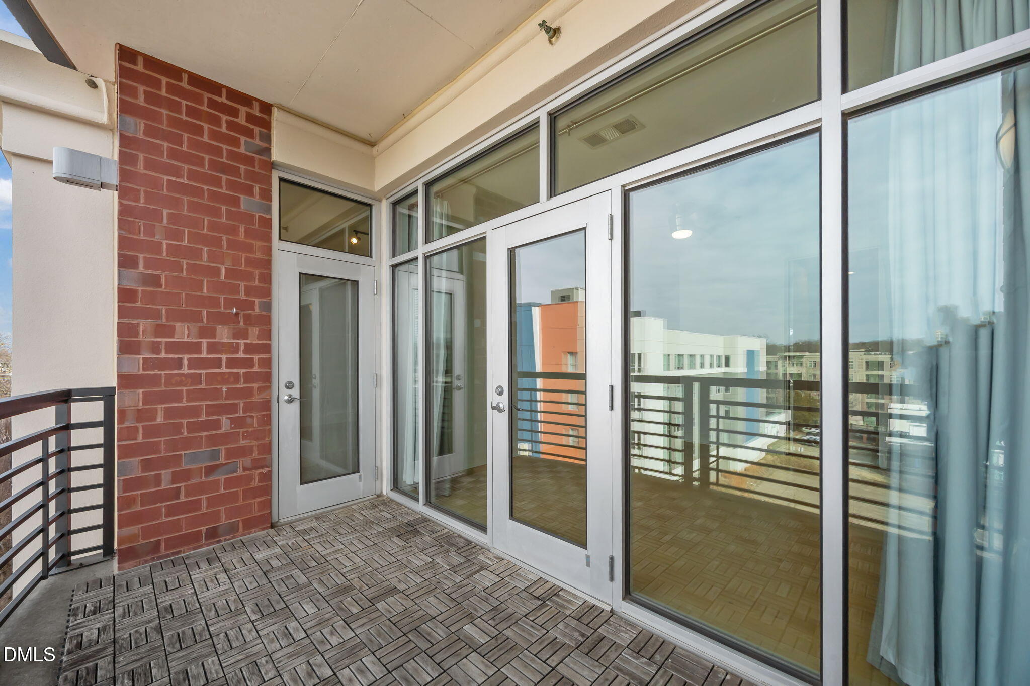 618 North Boylan Avenue, Unit 702 Raleigh, NC 27603 - Photo 20 of 42 a view of a brick house with a large window