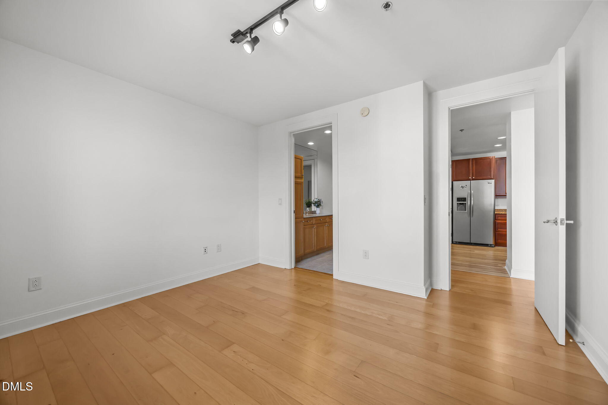 618 North Boylan Avenue, Unit 702 Raleigh, NC 27603 - Photo 27 of 42 wooden floor in an empty room