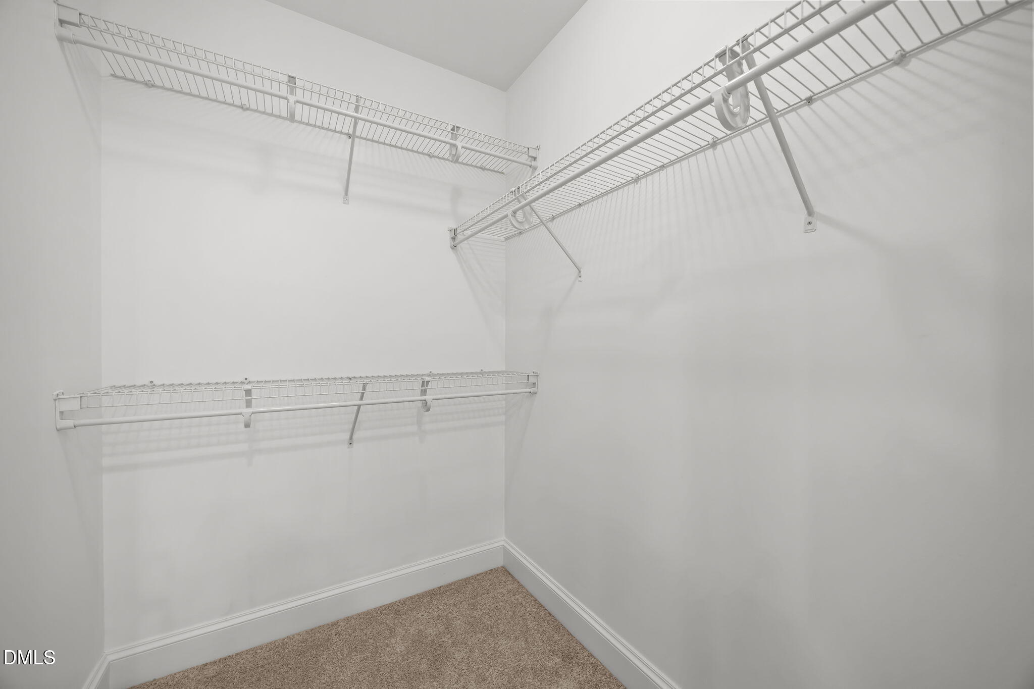 618 North Boylan Avenue, Unit 702 Raleigh, NC 27603 - Photo 32 of 42 a view of a room with racks on the wall