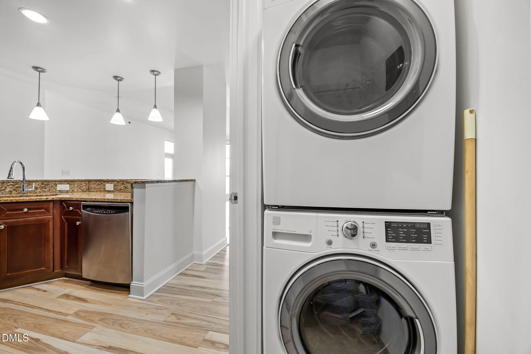 618 North Boylan Avenue, Unit 702 Raleigh, NC 27603 - Photo 10 of 42 a view of a kitchen with washer and dryer