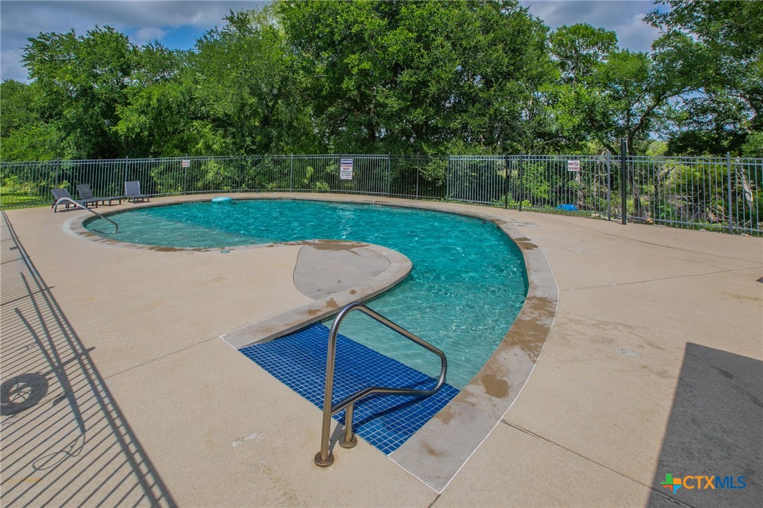 8304 Split Trl Cove Temple, TX 76502 - Photo 26 of 28 a view of a swimming pool with a patio
