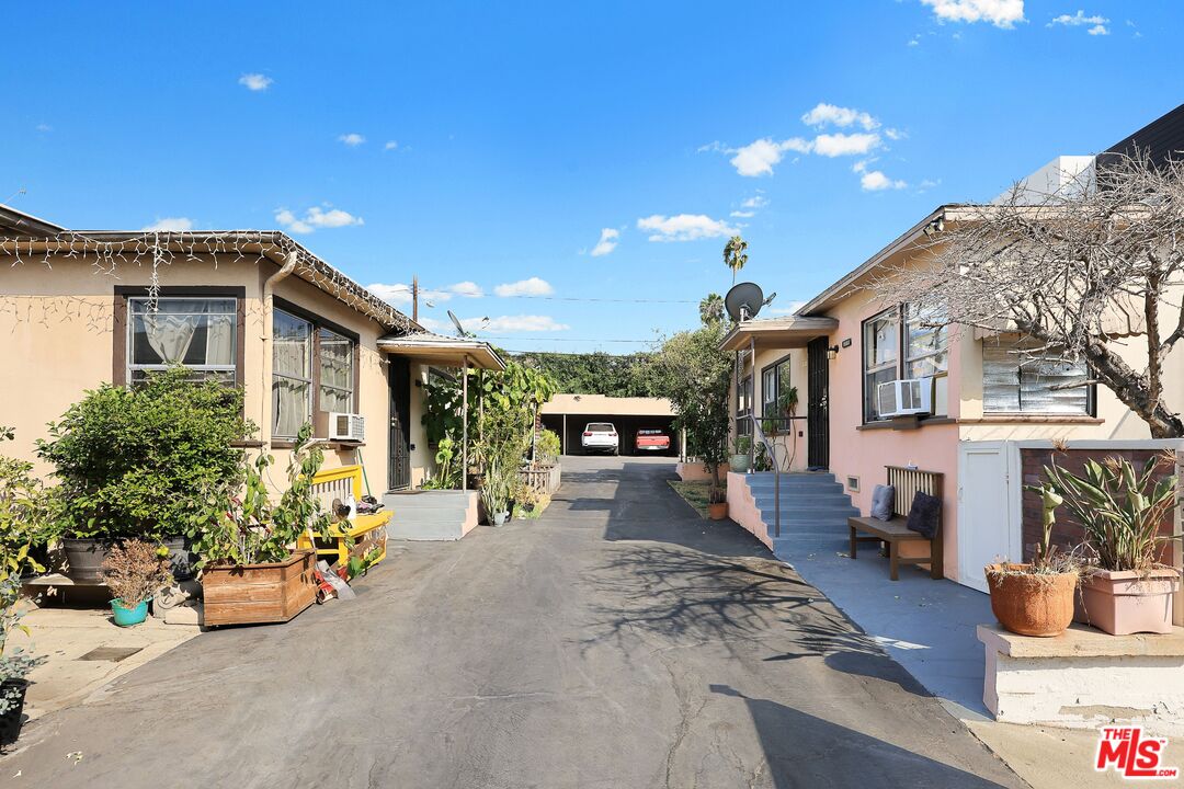 3214 Verdugo Road Los Angeles, CA 90065 - Photo 13 of 23 a view of a patio with couches and potted plants