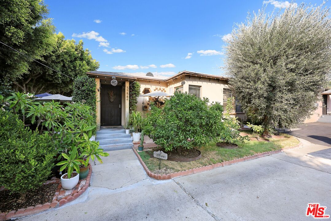 3214 Verdugo Road Los Angeles, CA 90065 - Photo 3 of 23 a front view of house with yard and green space