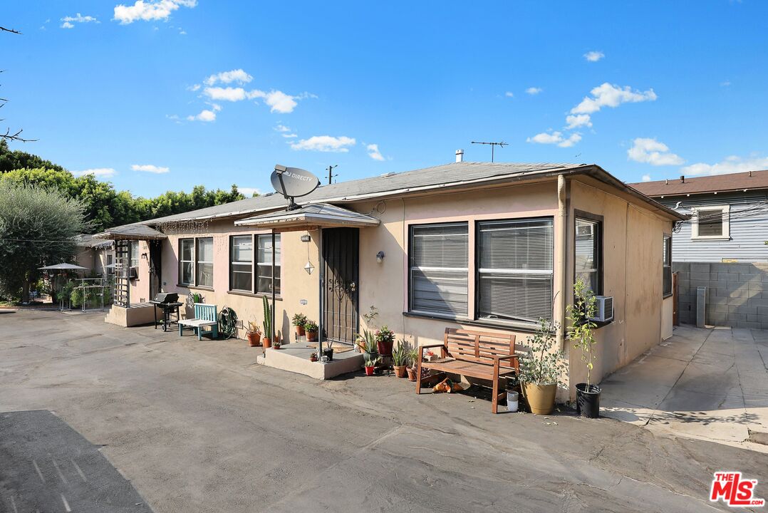 3214 Verdugo Road Los Angeles, CA 90065 - Photo 10 of 23 a view of a house with a large space and a car park in front of it
