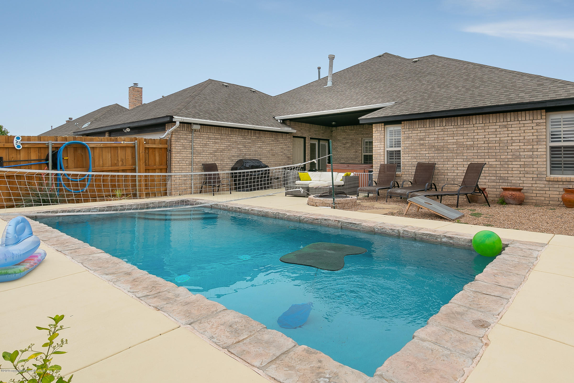 7411 Countryside Drive Amarillo, TX 79119 - Photo 27 of 39 a swimming pool with outdoor view