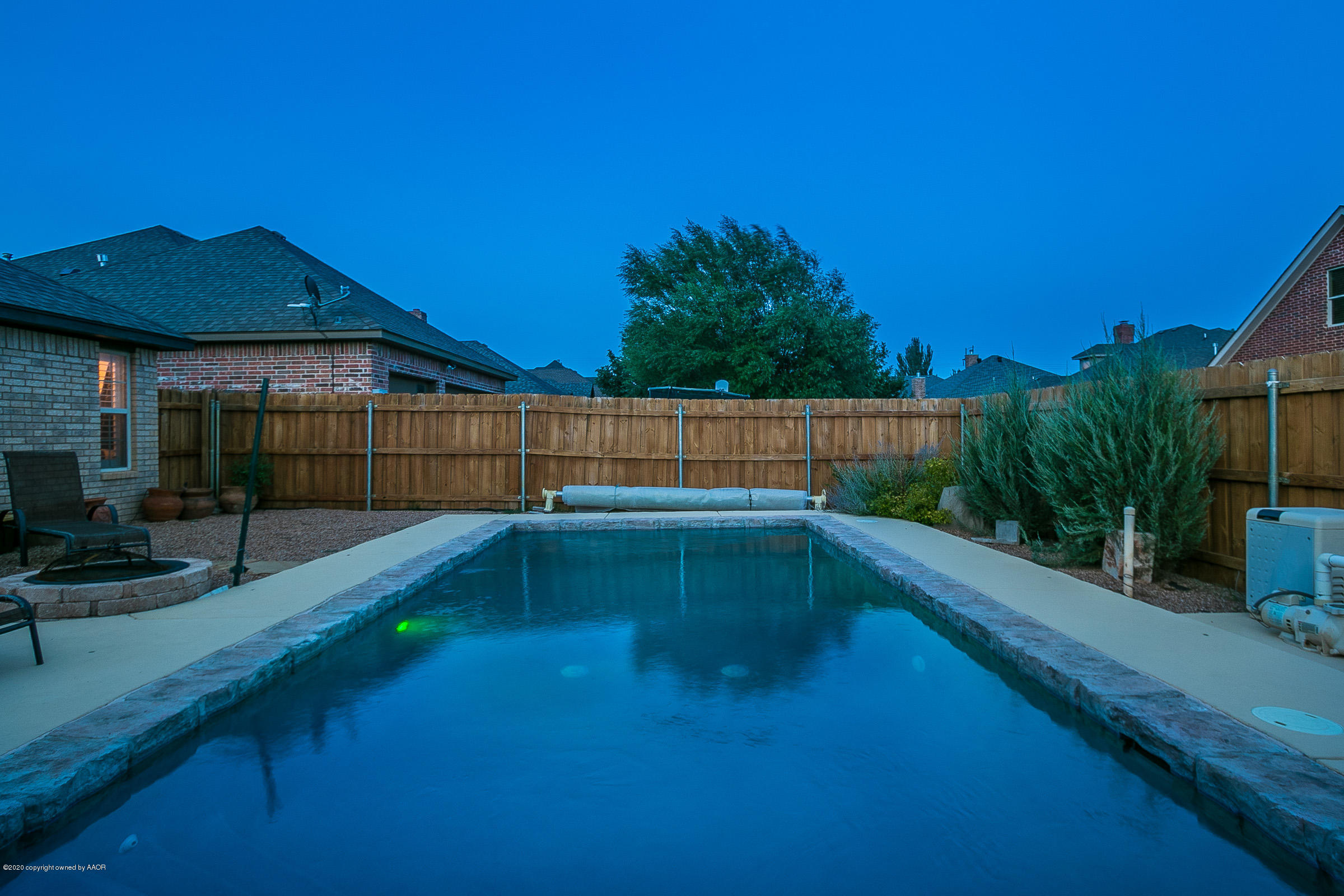 7411 Countryside Drive Amarillo, TX 79119 - Photo 38 of 39 a view of backyard with trampoline