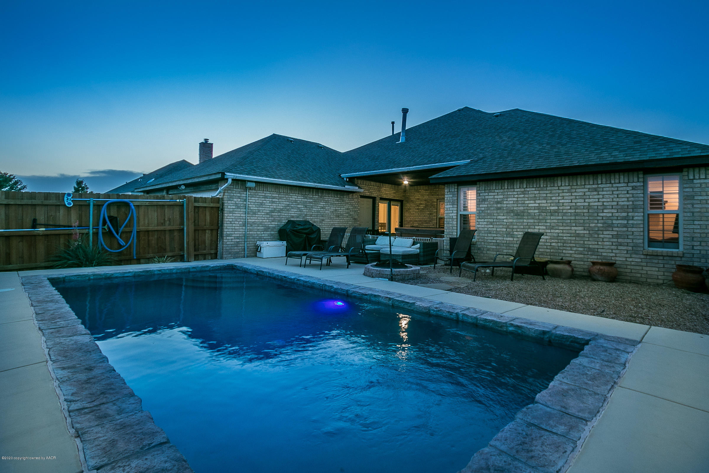 7411 Countryside Drive Amarillo, TX 79119 - Photo 5 of 39 a view of a house with swimming pool