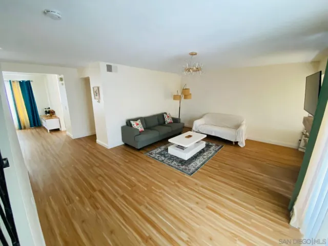 a spacious bathroom with a tub and shower