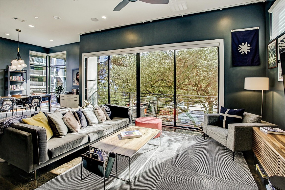 1004 California Street, Unit 101 Houston, TX 77006 - Photo 15 of 27 a living room with furniture and a large window