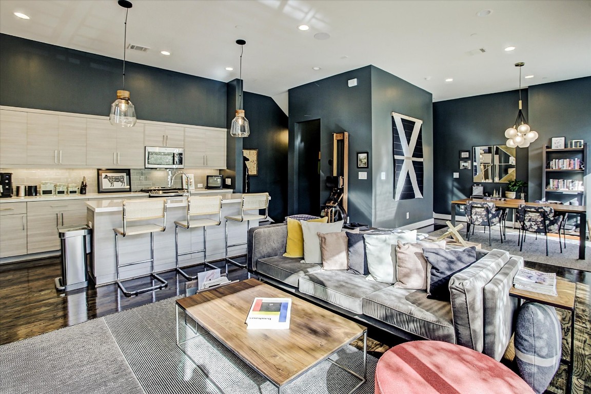 1004 California Street, Unit 101 Houston, TX 77006 - Photo 16 of 27 a kitchen with lots of appliances and cabinets