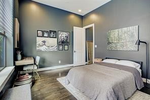 1004 California Street, Unit 101 Houston, TX 77006 - Photo 23 of 27 a bedroom with a bed and a desk