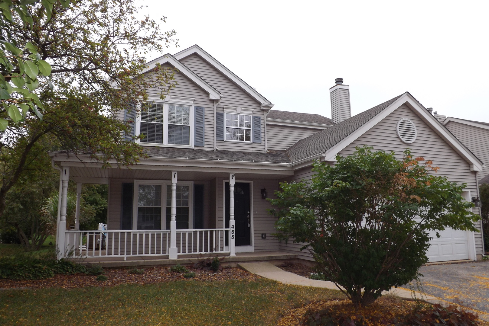 433 Prairie Valley Street Elburn, IL 60119 - Photo 2 of 21 a front view of a house with a garden