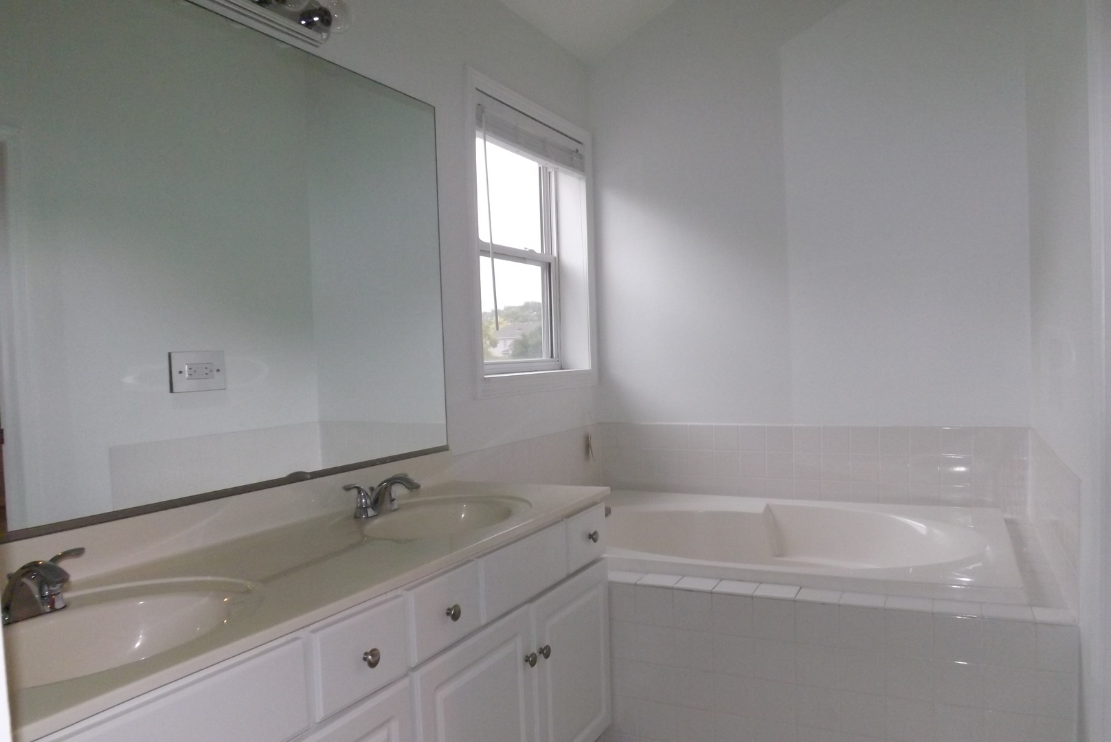 433 Prairie Valley Street Elburn, IL 60119 - Photo 17 of 21 a bathroom with a granite countertop sink a toilet and bathtub