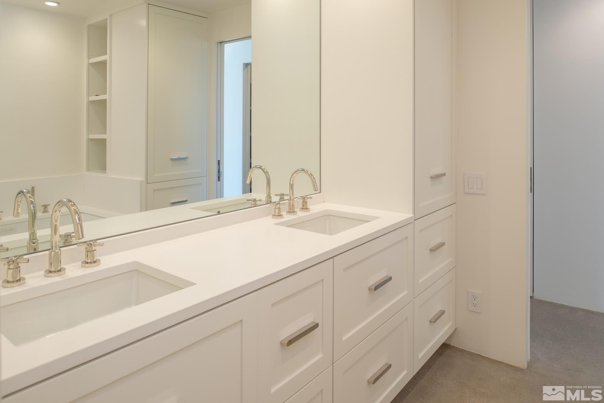 1200 Riverside Drive, Unit 1248 Reno, NV 89503 - Photo 35 of 40 a bathroom with a sink and a mirror