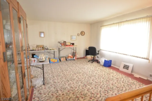 a room with furniture and a window