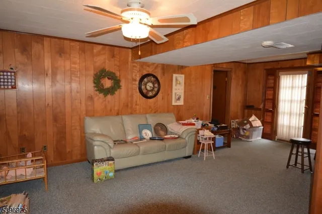 a view of a garden with a building in the background