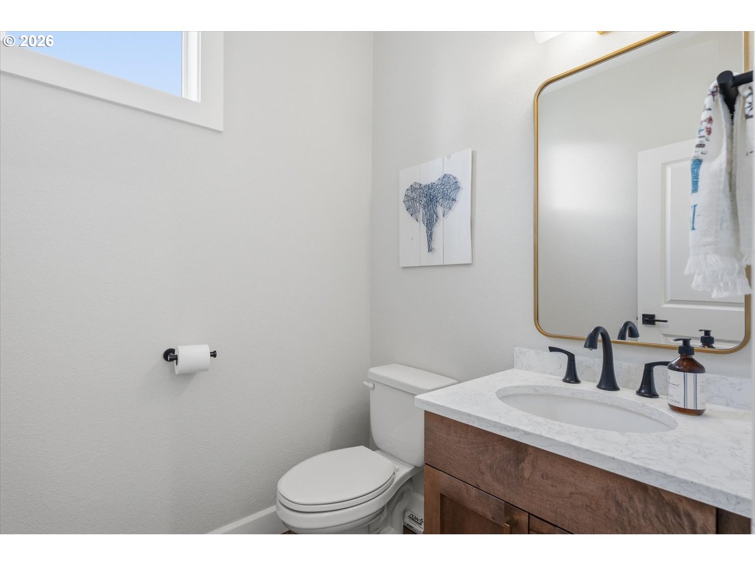 2059 Southeast 176th Avenue Portland, OR 97233 - Photo 11 of 31 a bathroom with a granite countertop sink toilet and mirror