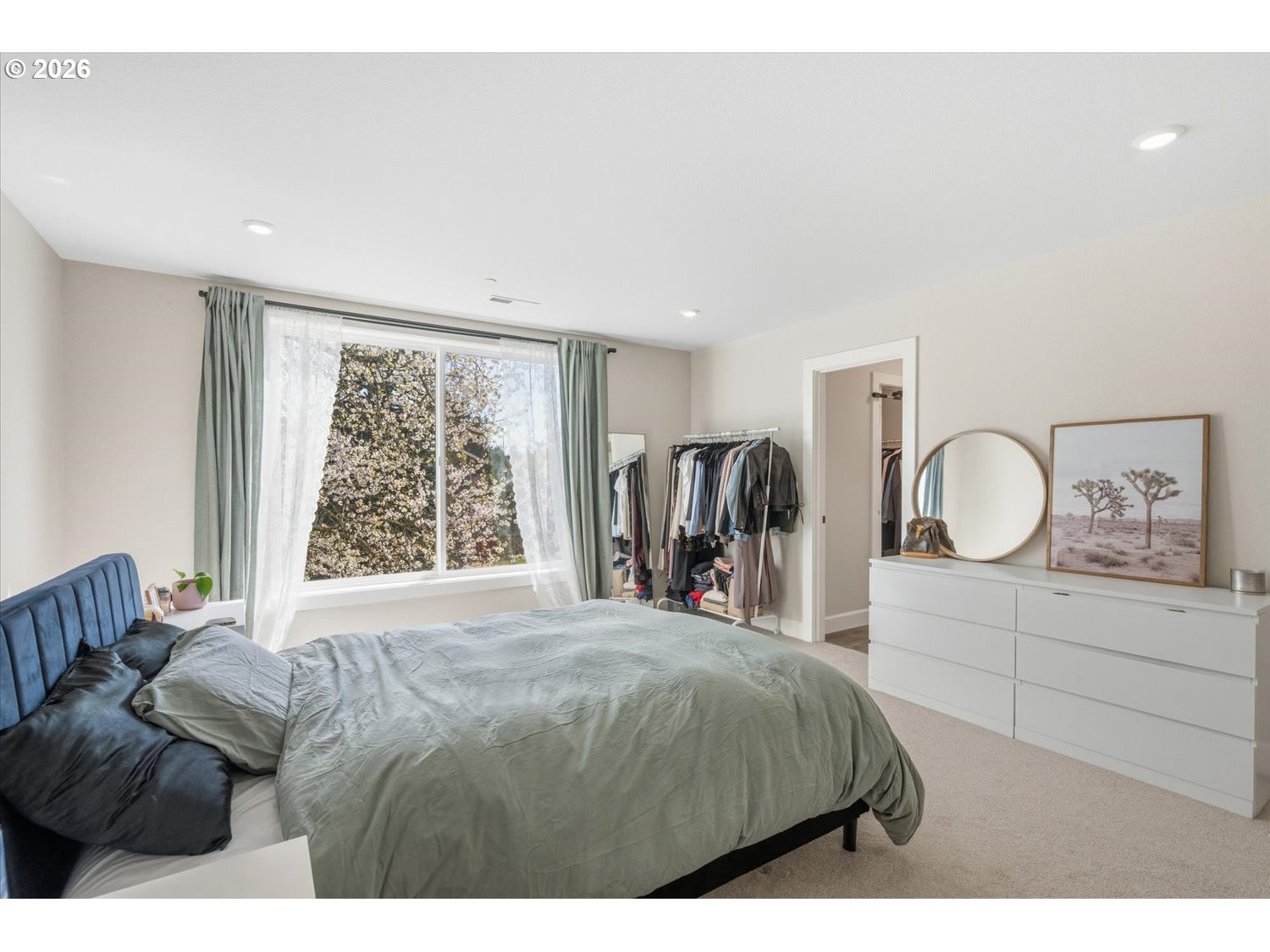 2059 Southeast 176th Avenue Portland, OR 97233 - Photo 14 of 31 a bedroom with a bed window and a large mirror