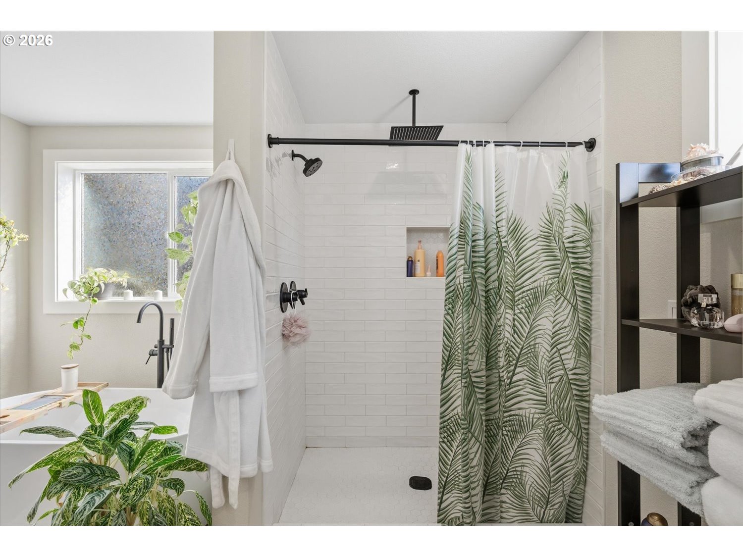 2059 Southeast 176th Avenue Portland, OR 97233 - Photo 18 of 31 a bathroom with a shower and a tub