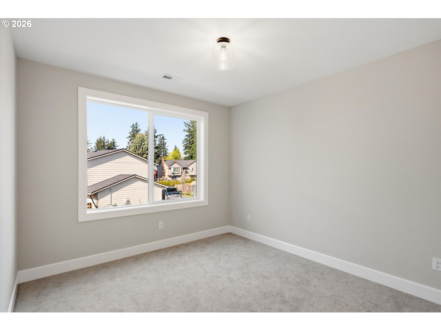 2059 Southeast 176th Avenue Portland, OR 97233 - Photo 19 of 31 an empty room with windows and window