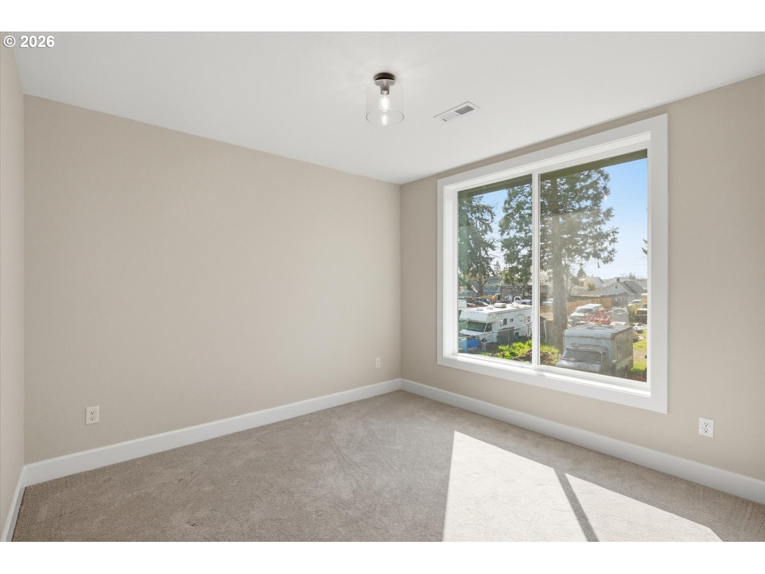 2059 Southeast 176th Avenue Portland, OR 97233 - Photo 21 of 31 a view of an empty room with a window