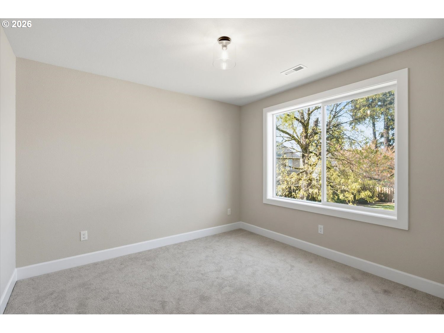 2059 Southeast 176th Avenue Portland, OR 97233 - Photo 23 of 31 a view of an empty room with a window