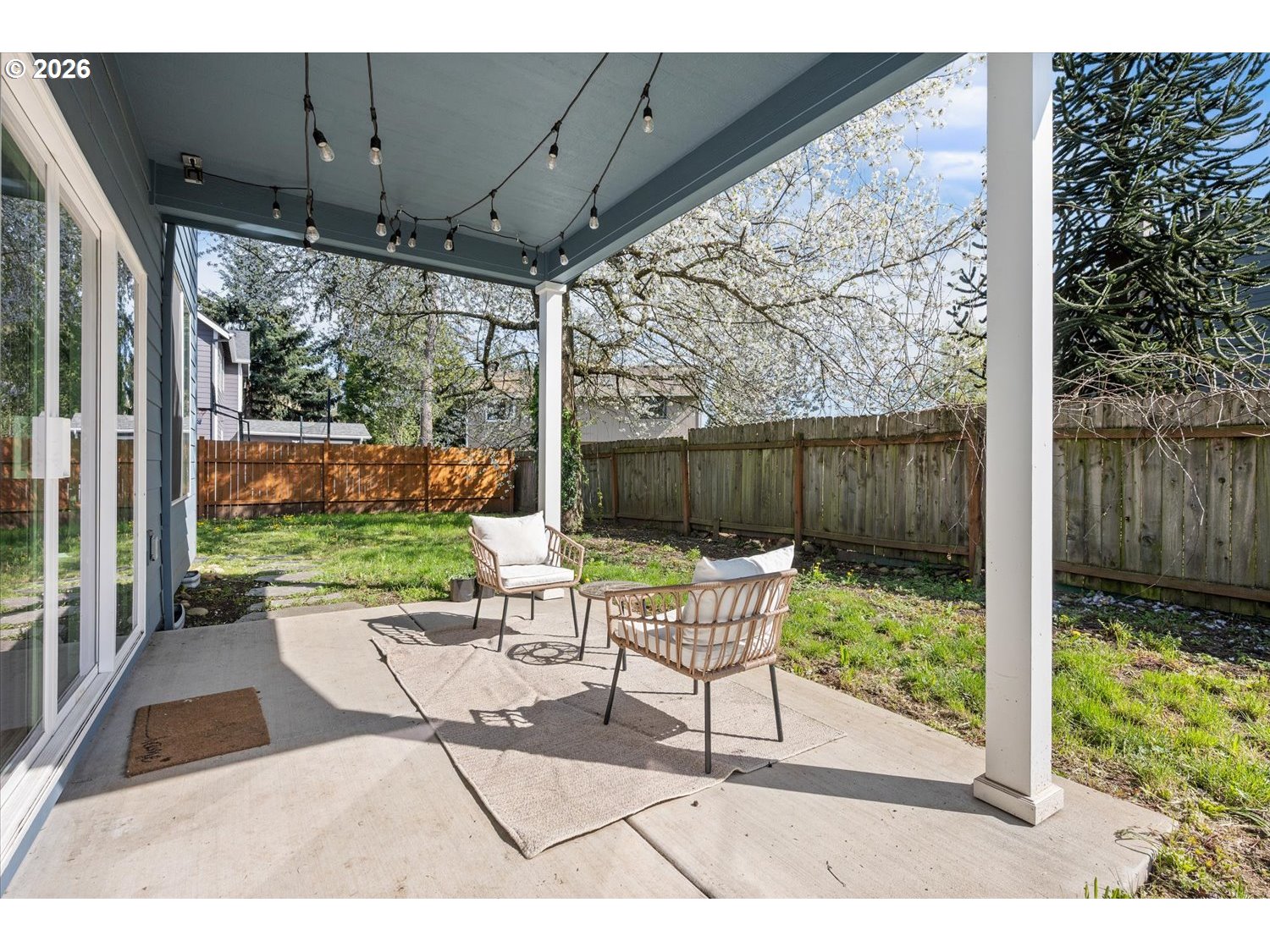 2059 Southeast 176th Avenue Portland, OR 97233 - Photo 27 of 31 a view of a chair and tables in the patio
