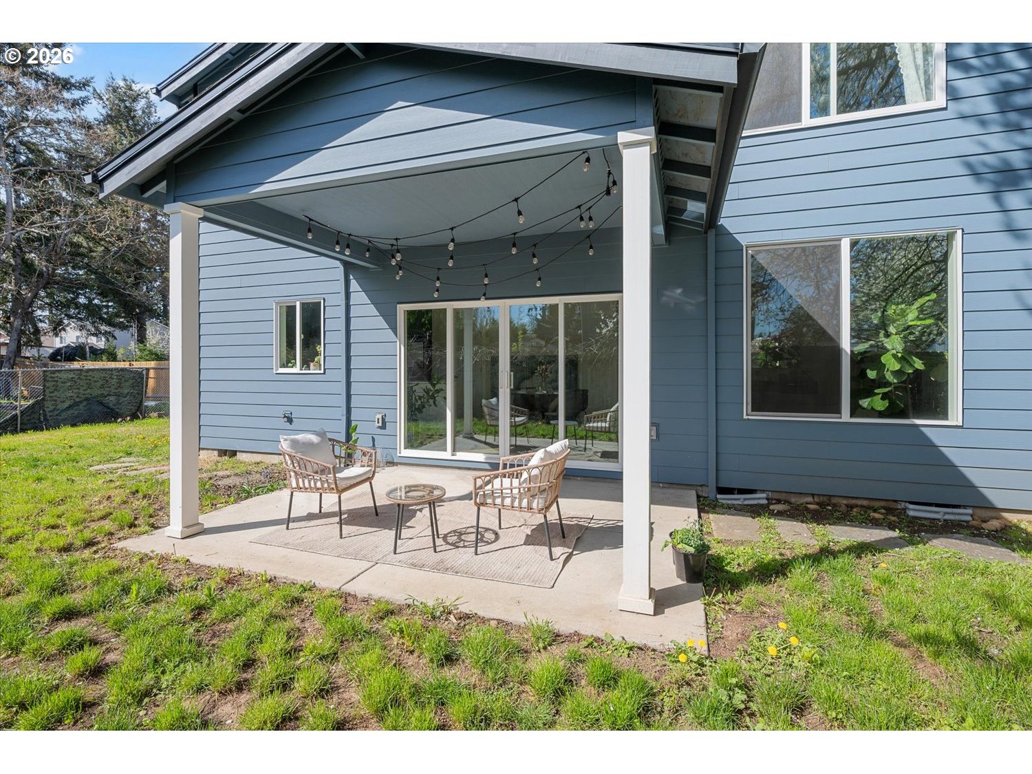 2059 Southeast 176th Avenue Portland, OR 97233 - Photo 28 of 31 a view of house with backyard and outdoor seating