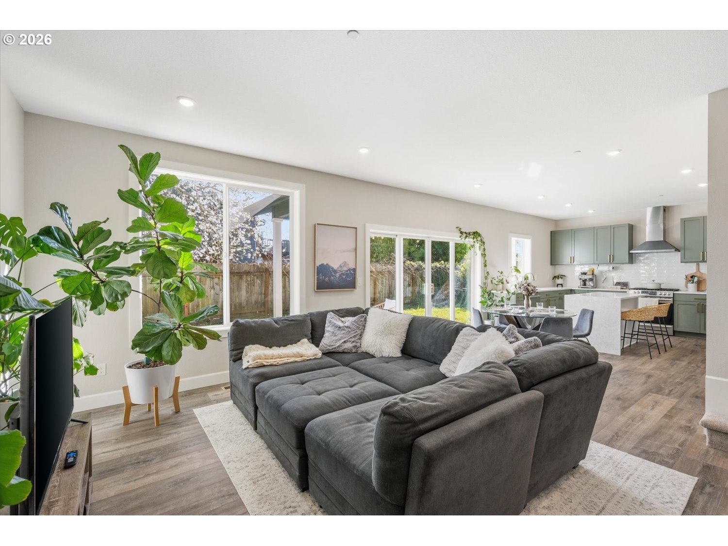 2059 Southeast 176th Avenue Portland, OR 97233 - Photo 9 of 31 a living room with furniture potted plant and a potted plant