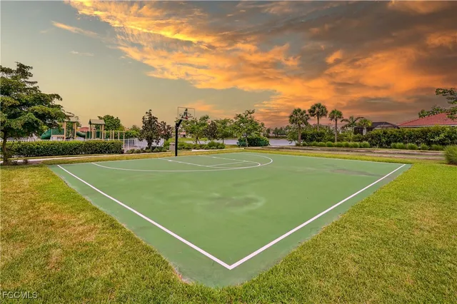 a view of an outdoor space and tennis court