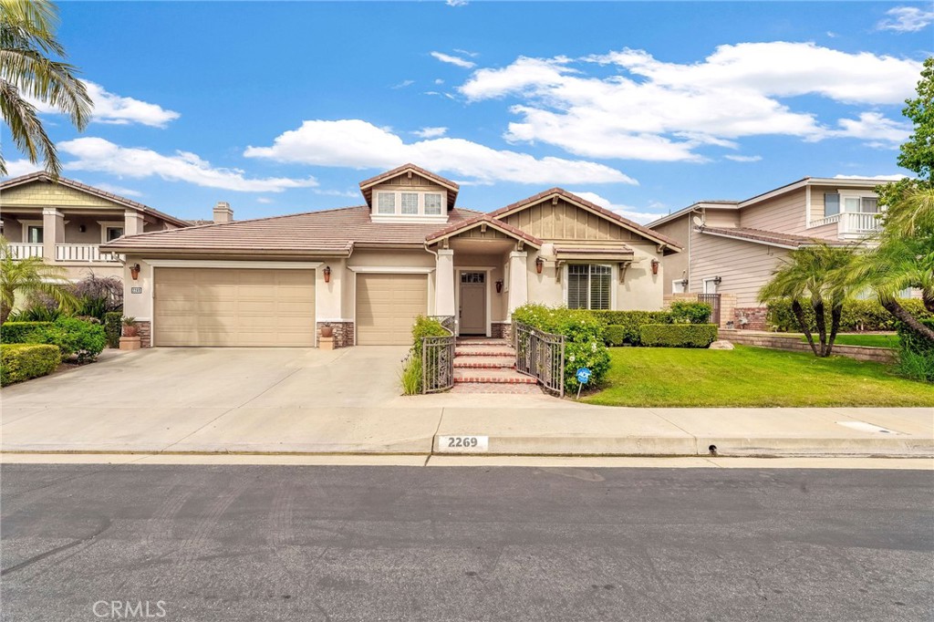 2269 Shady Oaks Road Glendora, CA 91741 - Photo 1 of 62 a front view of a house with a garden and garage