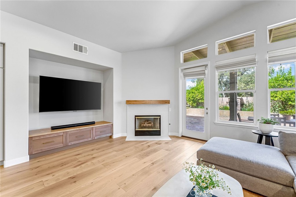 2269 Shady Oaks Road Glendora, CA 91741 - Photo 25 of 62 a living room with furniture and a fireplace