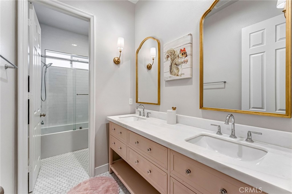 2269 Shady Oaks Road Glendora, CA 91741 - Photo 33 of 62 a spacious bathroom with a double vanity sink shower and a mirror