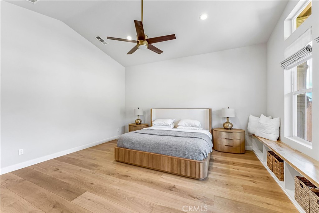 2269 Shady Oaks Road Glendora, CA 91741 - Photo 36 of 62 a bedroom with a bed and a chandelier